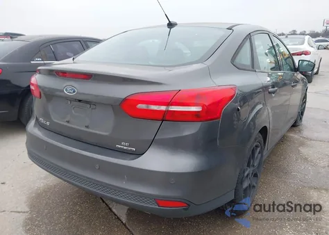 2016 Ford Focus Se z USA, uszkodzony, nr VIN 1FADP3F23GL275187